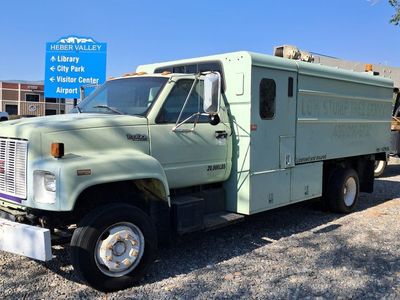 GMC Commercial Chip Dump Truck with Utility Crew Cab Body