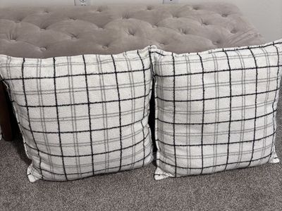 White and black striped throw pillows