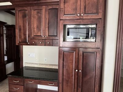 Kitchen cabinets and microwave