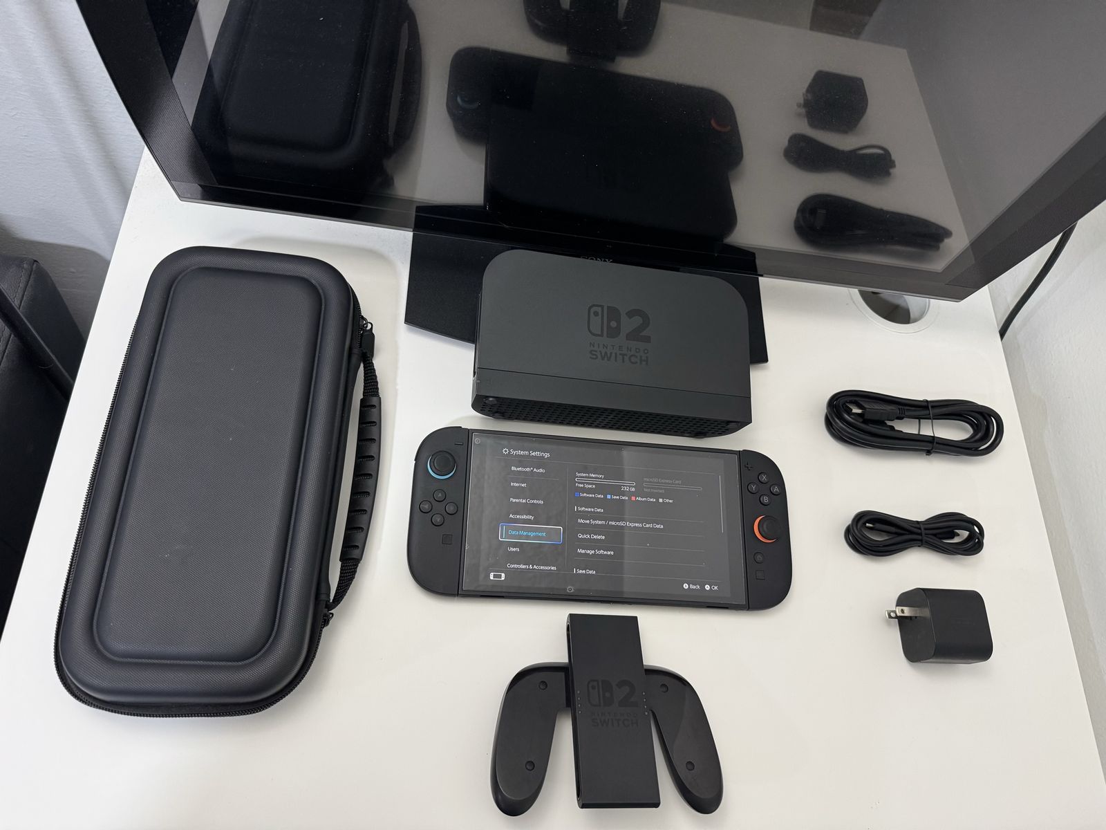 Nintendo Switch 2 / Dock / Joy Cons / Charger / HDMI Cable / Carrying Case