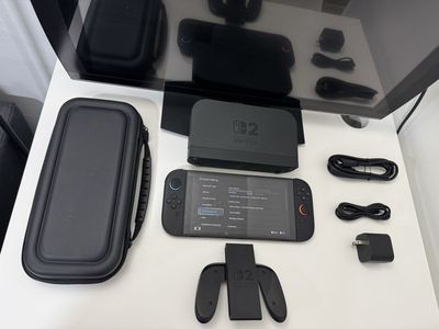 Nintendo Switch 2 / Dock / Joy Cons / Charger / HDMI Cable / Carrying Case