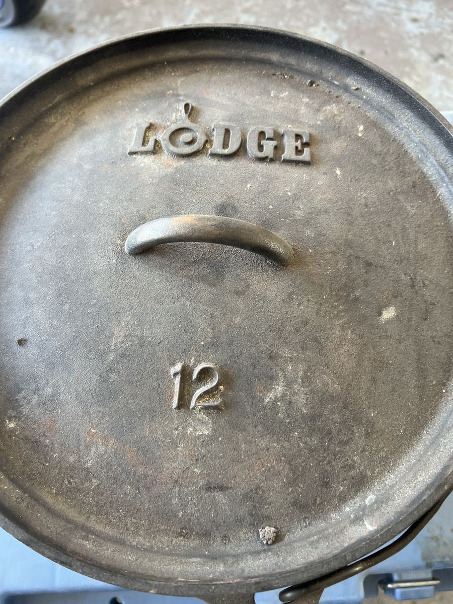 Lodge 12-Inch Cast Iron Camp Dutch Oven with Lid and Bail Handle
