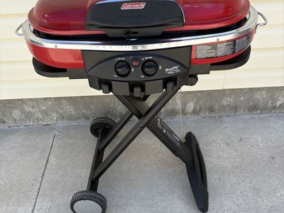 Coleman Roadtrip Portable Propane Grill - 2 Burner, Matchless Ignition, Quick-Fold Legs, Wheels