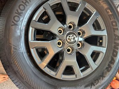 Like-New 2025 Toyota Land Cruiser OEM Rims + Yokohama Geolandar Tires — Driven