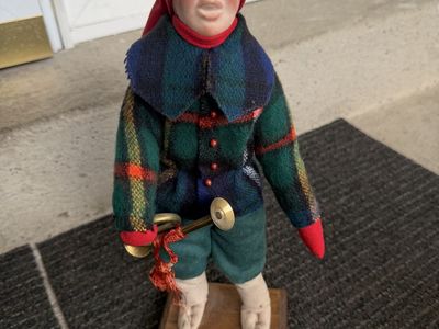 Vintage Porcelain Face Elf Doll with Plaid Jacket and Horn on Wood Base