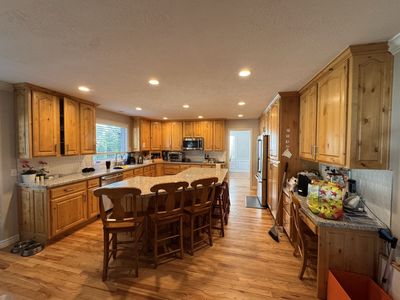 Full kitchen with granite counters plus GE Cafe microwave and GE induction stove top. $3500 obo