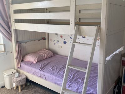 Twin bunk beds and dresser.
