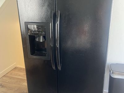 GE Side-by-Side Black Refrigerator with Ice Dispenser