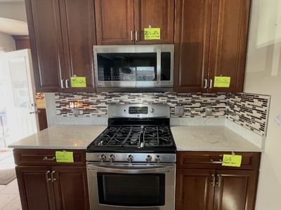 Cherry Kitchen Cabinets & Granite Counter Tops