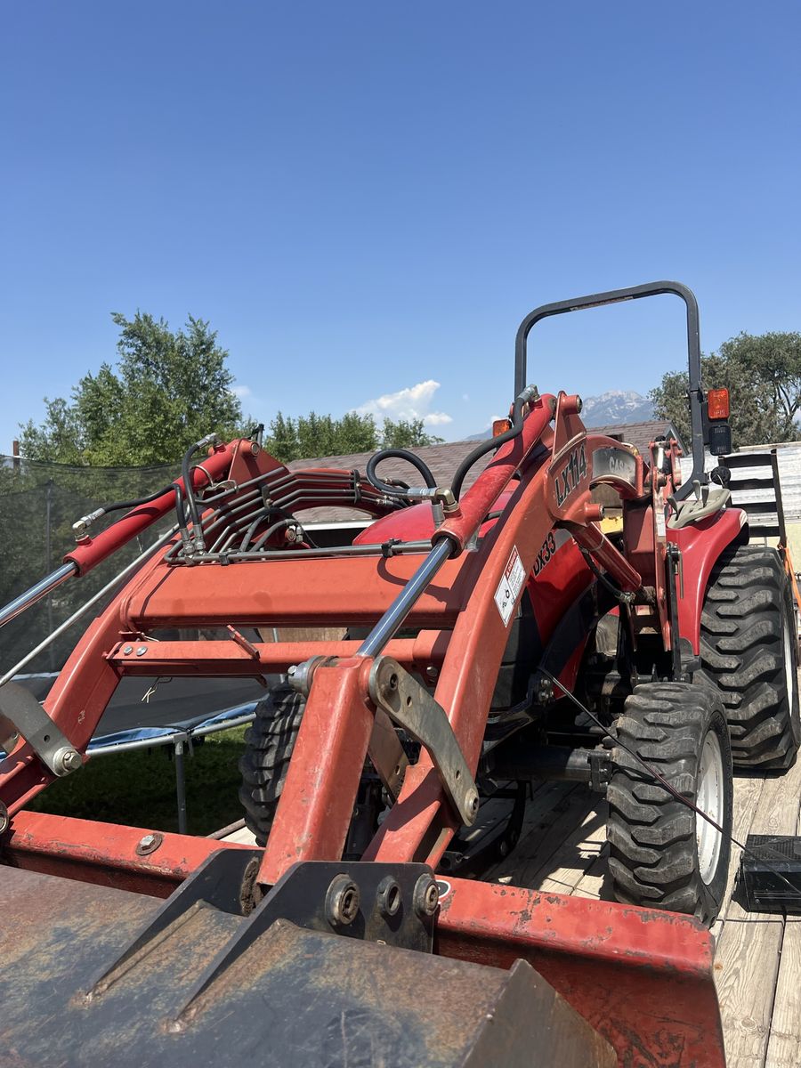 This is the Case d33 tractor. 33 hp backhoe