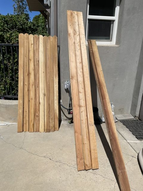 New fence wood: Cedar fence pickets, 2x4 studs, 2x4 kiln-dried fir studs
