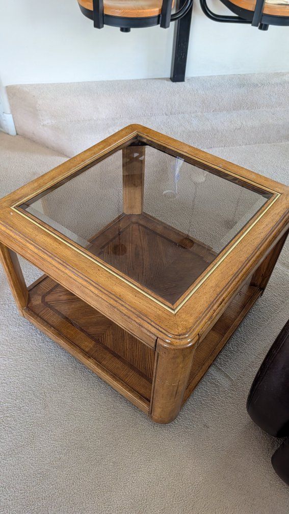 Wooden side table with glass top