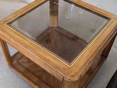 Wooden side table with glass top