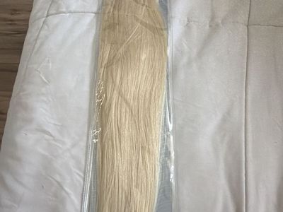 22” blonde human hair weft extensions
