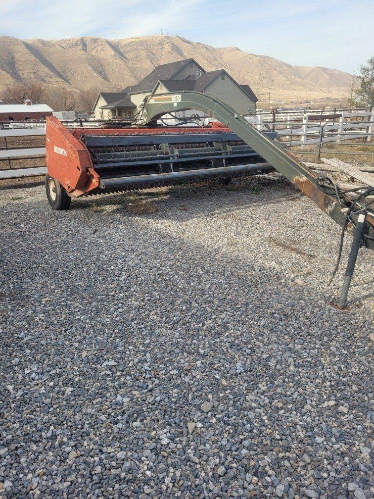 REDUCED PRICE Hesston 1160 hydra swing swather