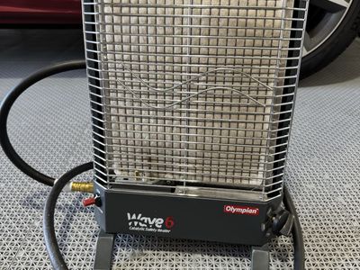 RV/Camping Propane heater. Camco Olympian Wave 6 Catalytic Safety Heater with Hose