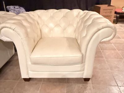 Two White Faux Leather Chairs