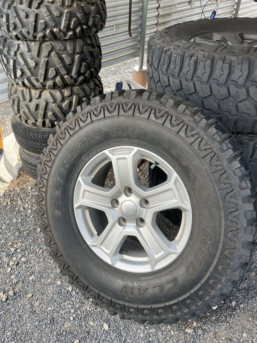 35x12.50R17 LT M/T Tires on Jeep Wheels – Set of 5