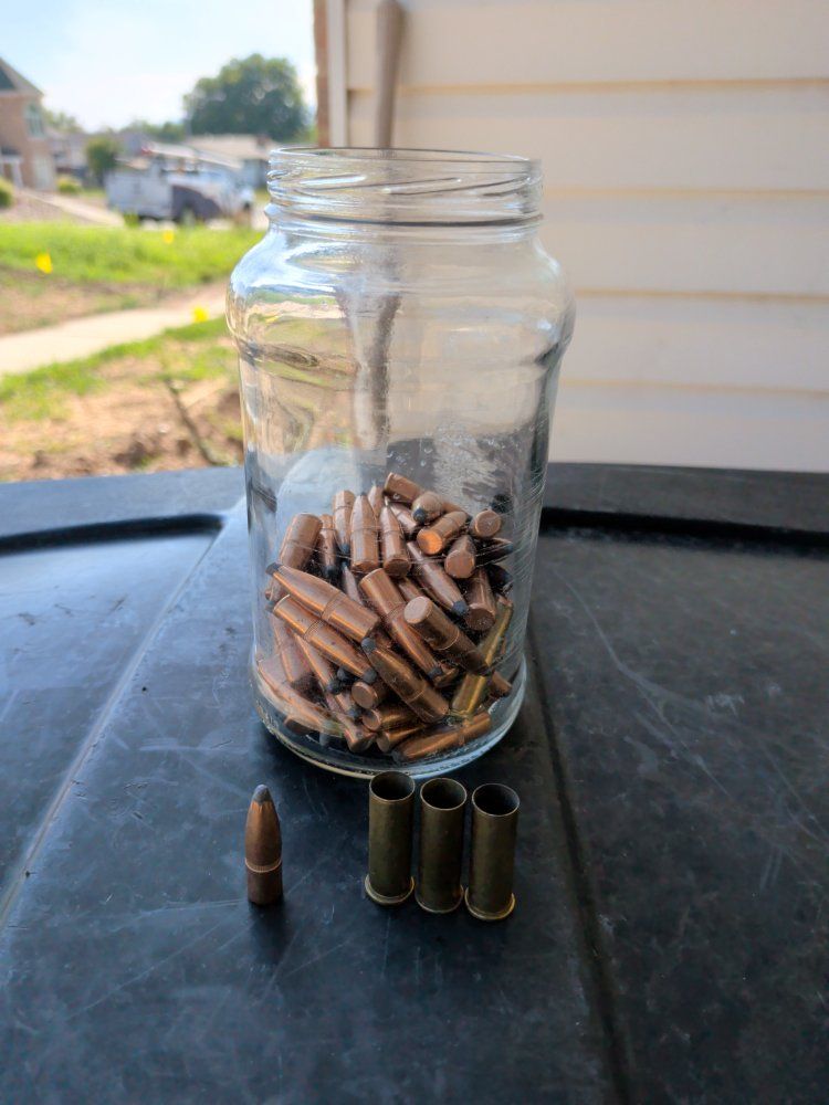 Ammunition Jar - bullets all same size and spent casings between 38 and 357