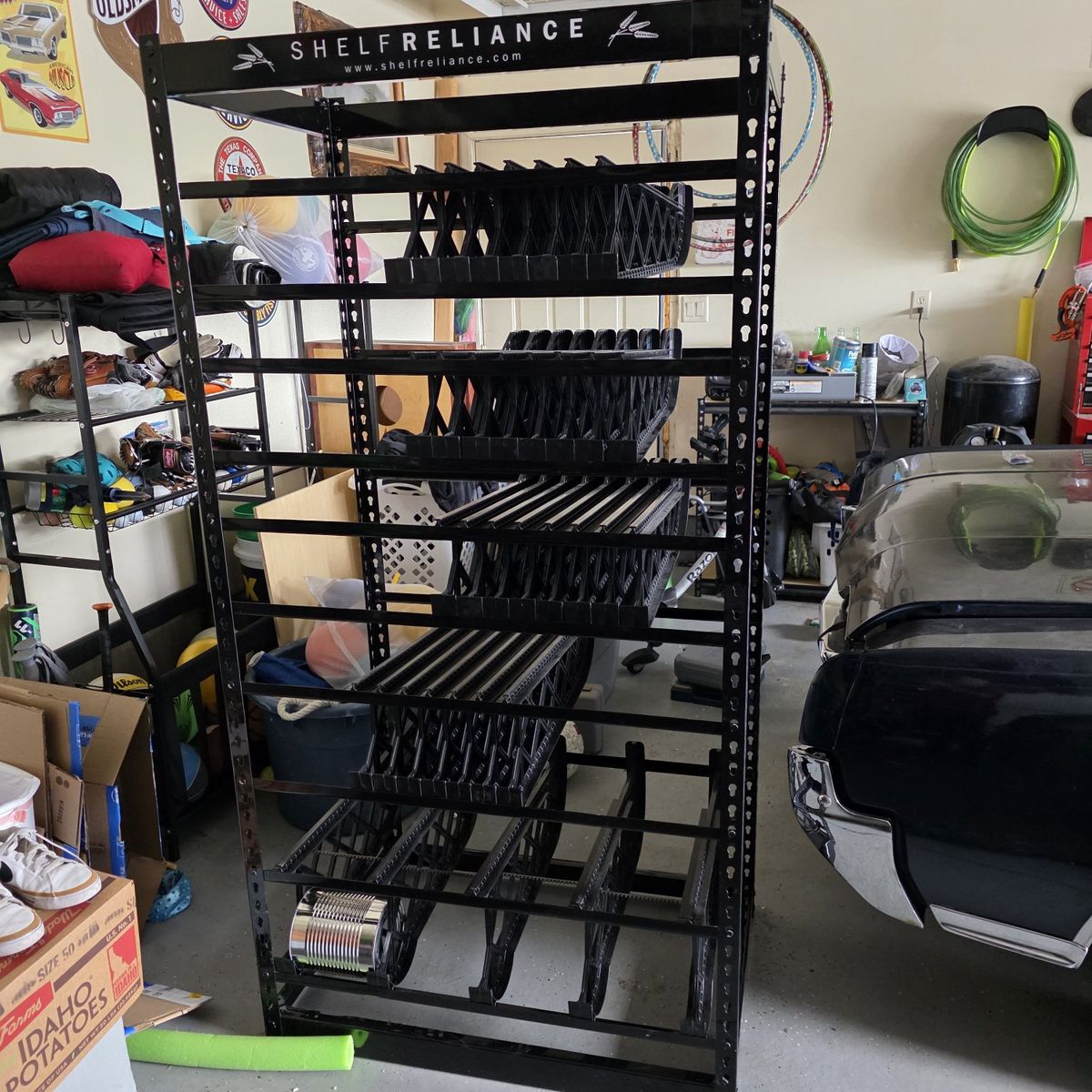 Shelf reliance full size can rotation system