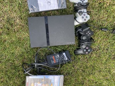 PlayStation 2 with games