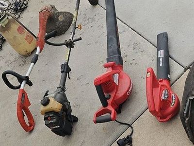 Lot of 4 yard tools, 2 blowers Troy Bilt & Homelite and 2 trimmers Bolen & Black & Decker