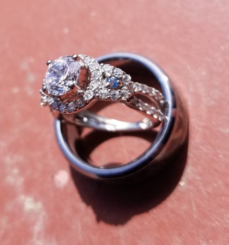 10K WHITE GOLD HALO STYLE ( .82 CARAT TOTAL)