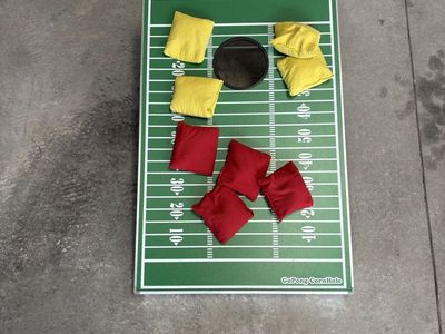GoPong Football Cornhole Game Set with Red and Yellow Bean Bags