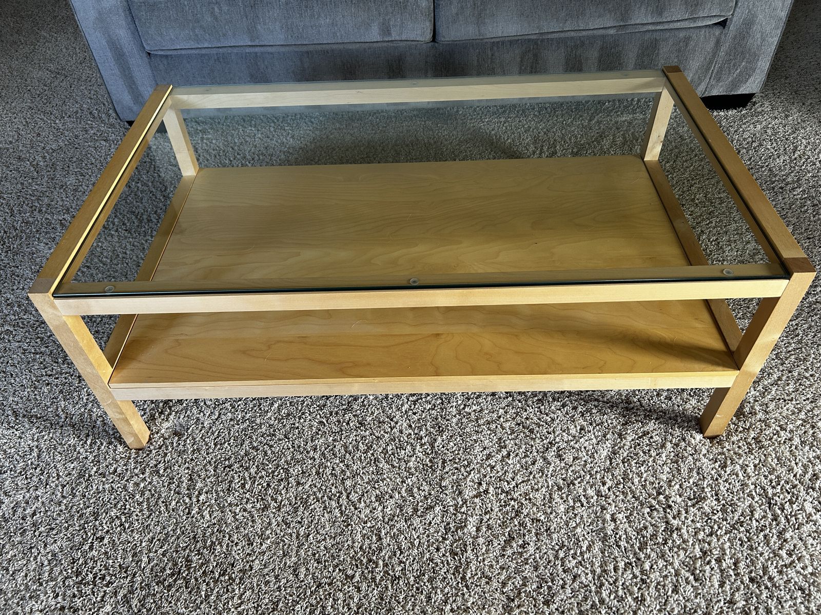 Coffee table with glass top