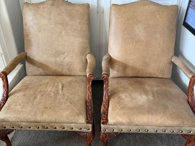 Two beautiful Italian all leather chairs.