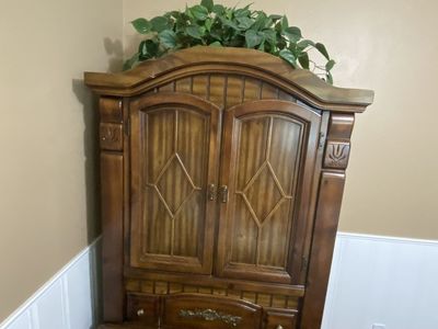 Armoire with Drawers and Cabinet Storage.