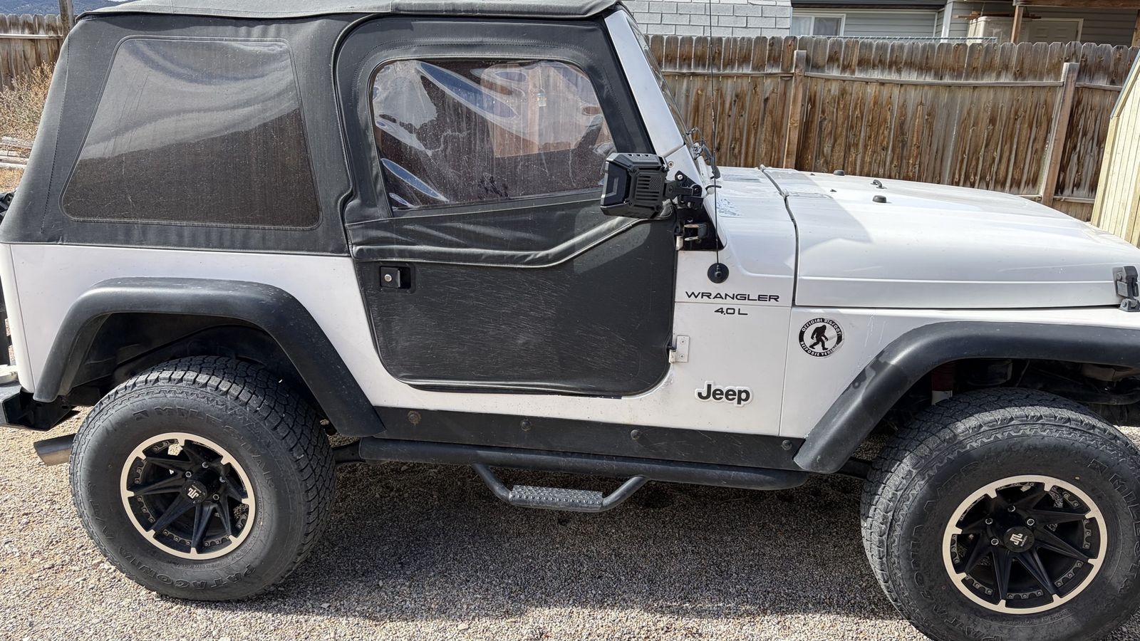 White Jeep Wrangler 4.0L with Soft Top and Custom Black Grill ...