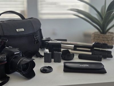 Nikon D7500 DSLR Complete Kit - Camera, lens, carry bag, polarizing filters, tripod, charger, batteries, and SD card