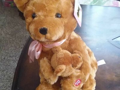 MAMA BEAR SINGS LULLABY AND PATS BABY'S BACK