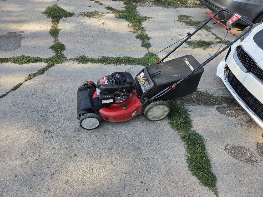 Troy bil Lawn mower self propelled with the Honda motor.