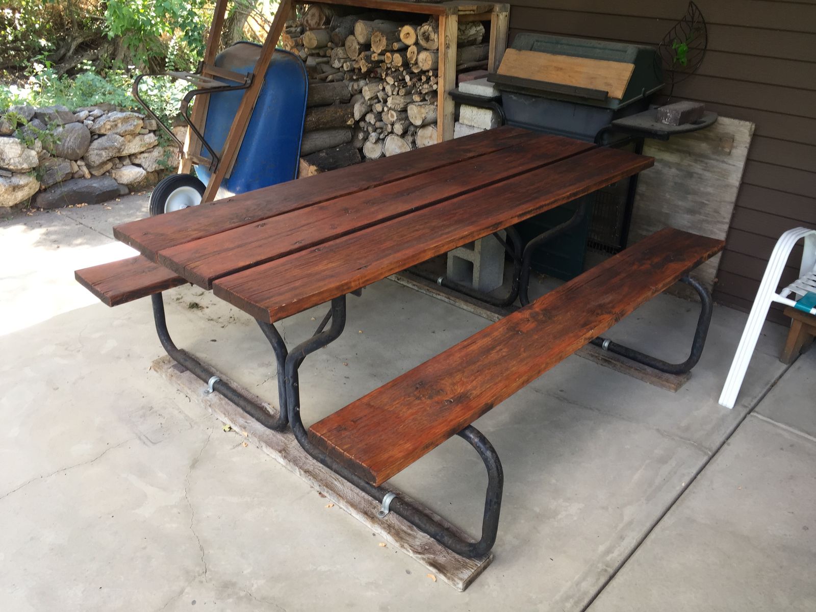Sturdy Wooden Picnic Table with Steel Frame and Attached Benches