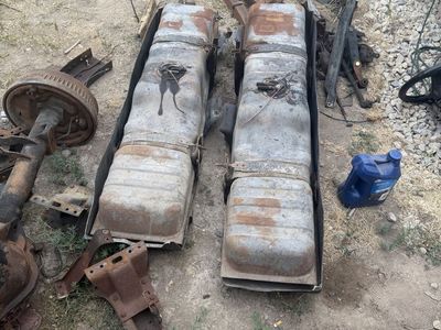 Pair of Used Chevrolet Metal Fuel saddle Tanks with Mounting Straps and Brackets off a 1985 C-20