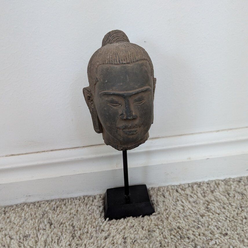 Head of King Jayavarman VII on a stand