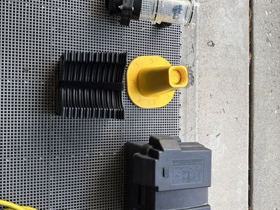 Trailer accessories, dual flush tank cleaner, tongue jack, battery box, sewer hose support