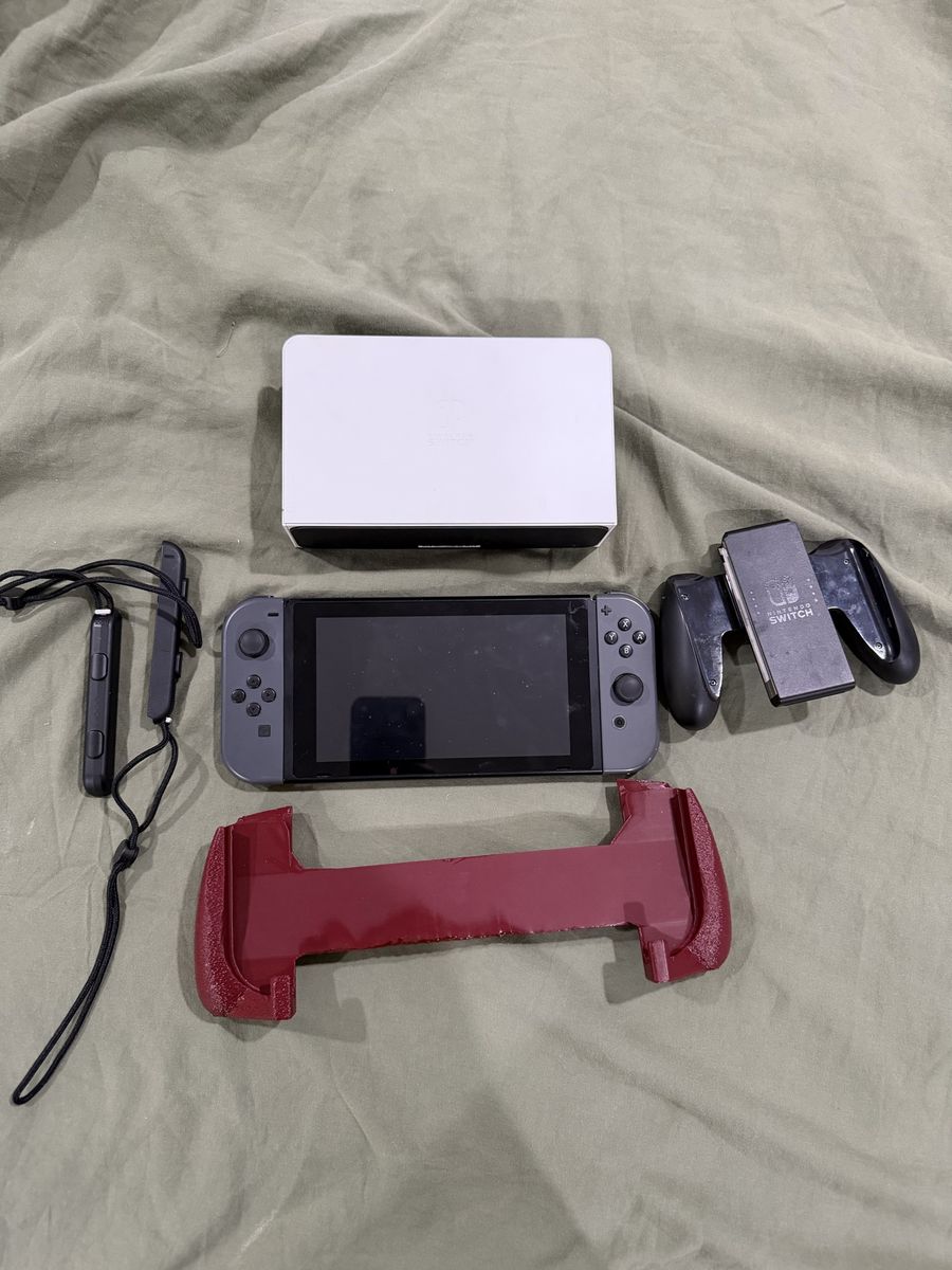 Nintendo Switch Console with Gray Joy-Cons, Dock, and Accessories