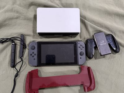 Nintendo Switch Console with Gray Joy-Cons, Dock, and Accessories