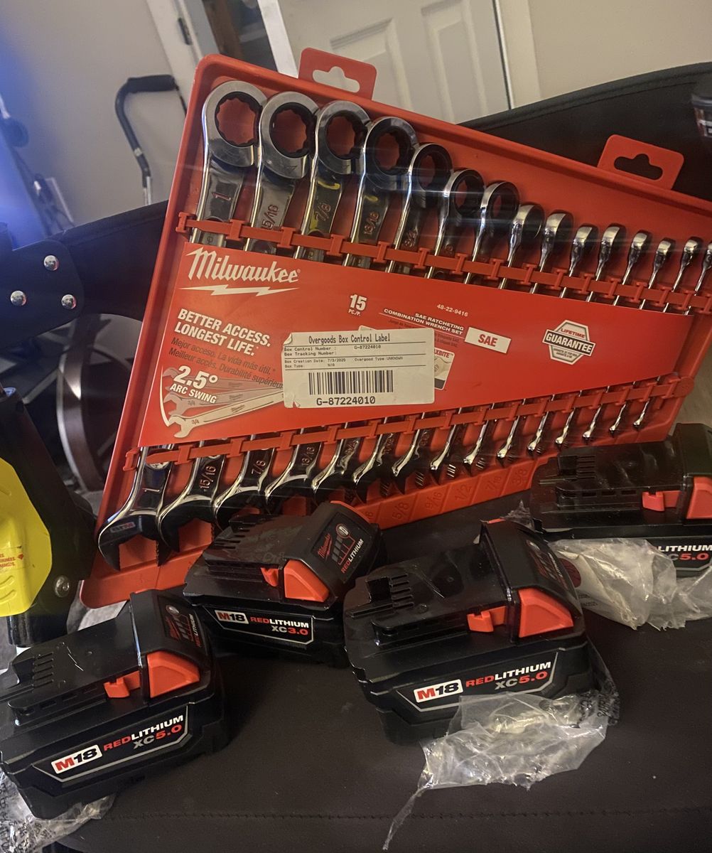 Milwaukee batteries and wrenches