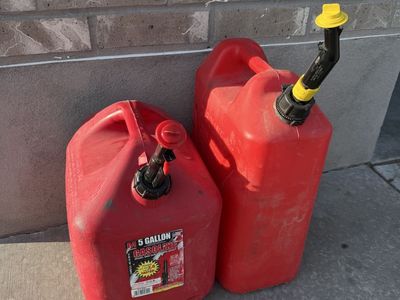 (2) 5 gallon gas cans