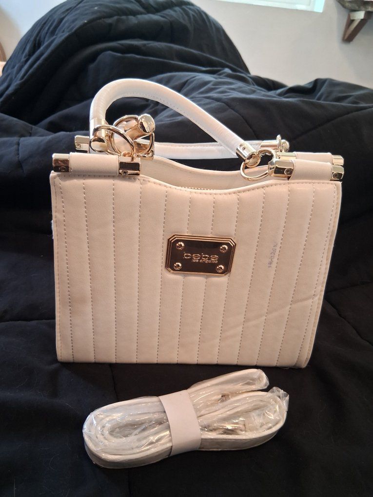Bebe Quilted White Handbag with Gold Hardware and Removable Strap