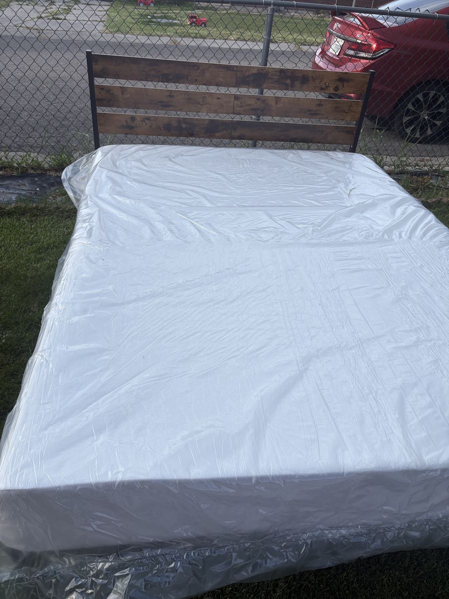 Brand new queen size bed with mattress