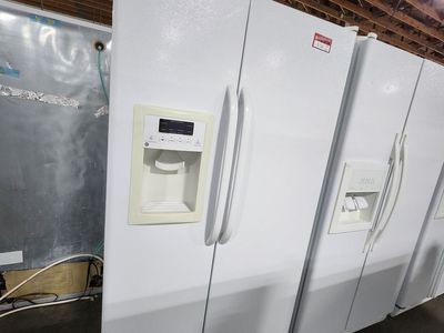 NICE WHITE GE SIDE BY SIDE FRIDGE! WITH A FULL WARRANTY
