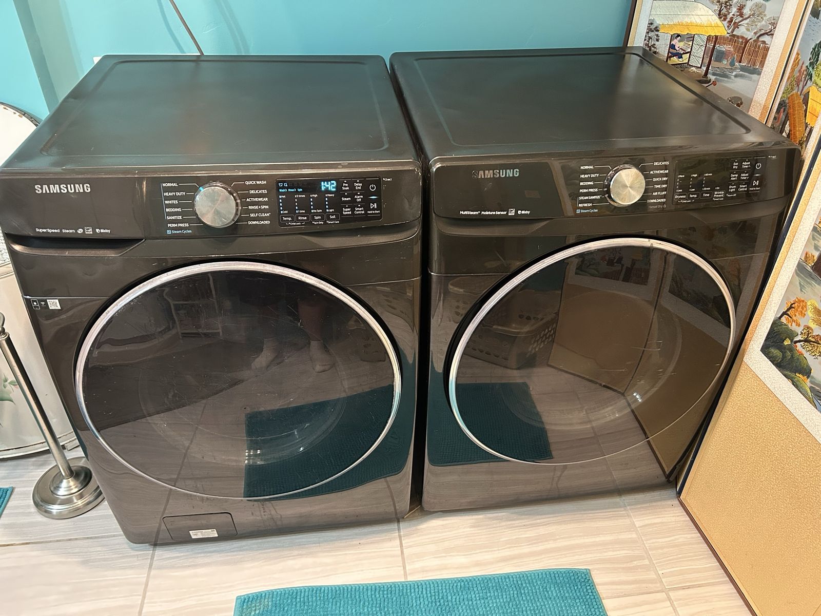 Set Of Black Stainless Samsung Front Load Steam Washer & Electric Dryer, Bixby WiFi Capable in Great Working Condition