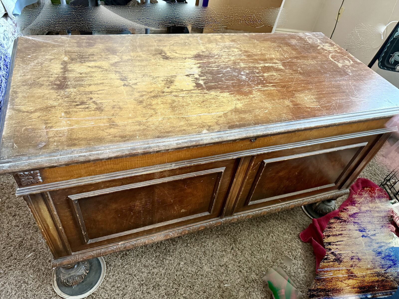 Solid wood antique hope chest, cedar lined.  Locking, comes with key.