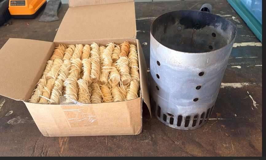 Charcoal chimney starter with box of fire starters