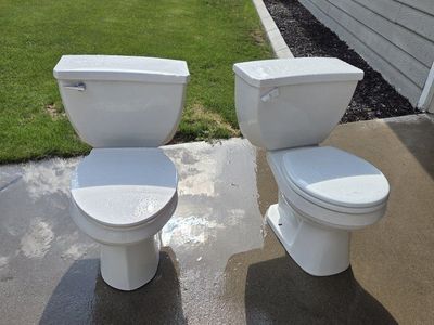 Pair of White Ceramic Two-Piece Toilets